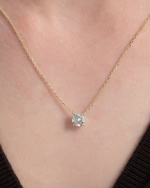 Cushion cut diamond necklace worn on neck – elegant gold diamond necklace