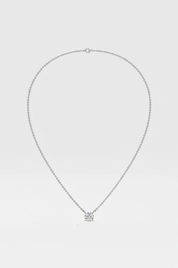 Diamond necklace on a light gray background