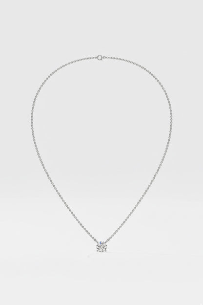 Diamond necklace on a light gray background