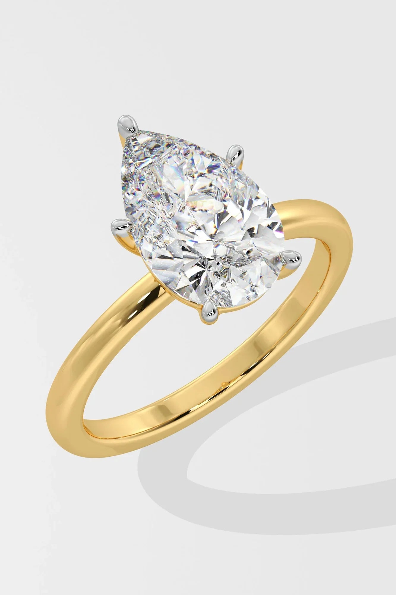 PEAR SOLITAIRE RING