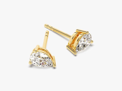 Gold earrings with clear diamond on a white background