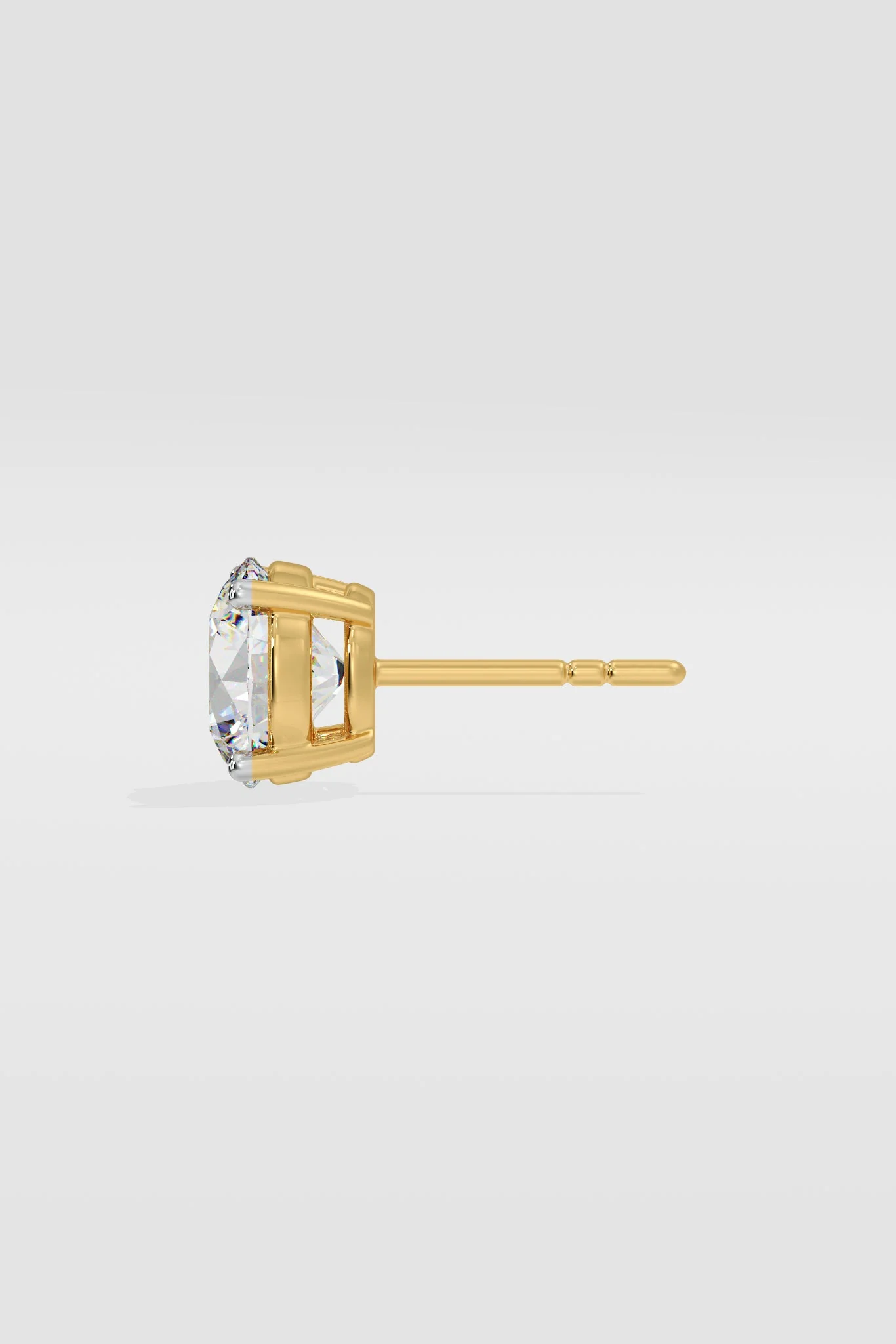 Gold Diamond stud earring on a light gray background