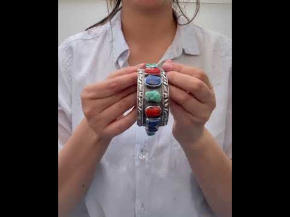 Video of Handcrafted 925 sterling silver cuff bracelet with turquoise, blue and orange semi-precious stones
