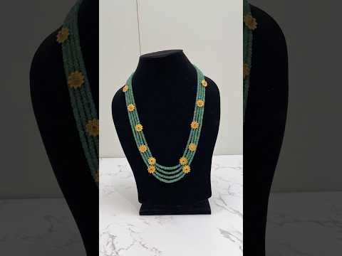 Video of 925 hallmarked sterling silver green beaded necklace with flower motif